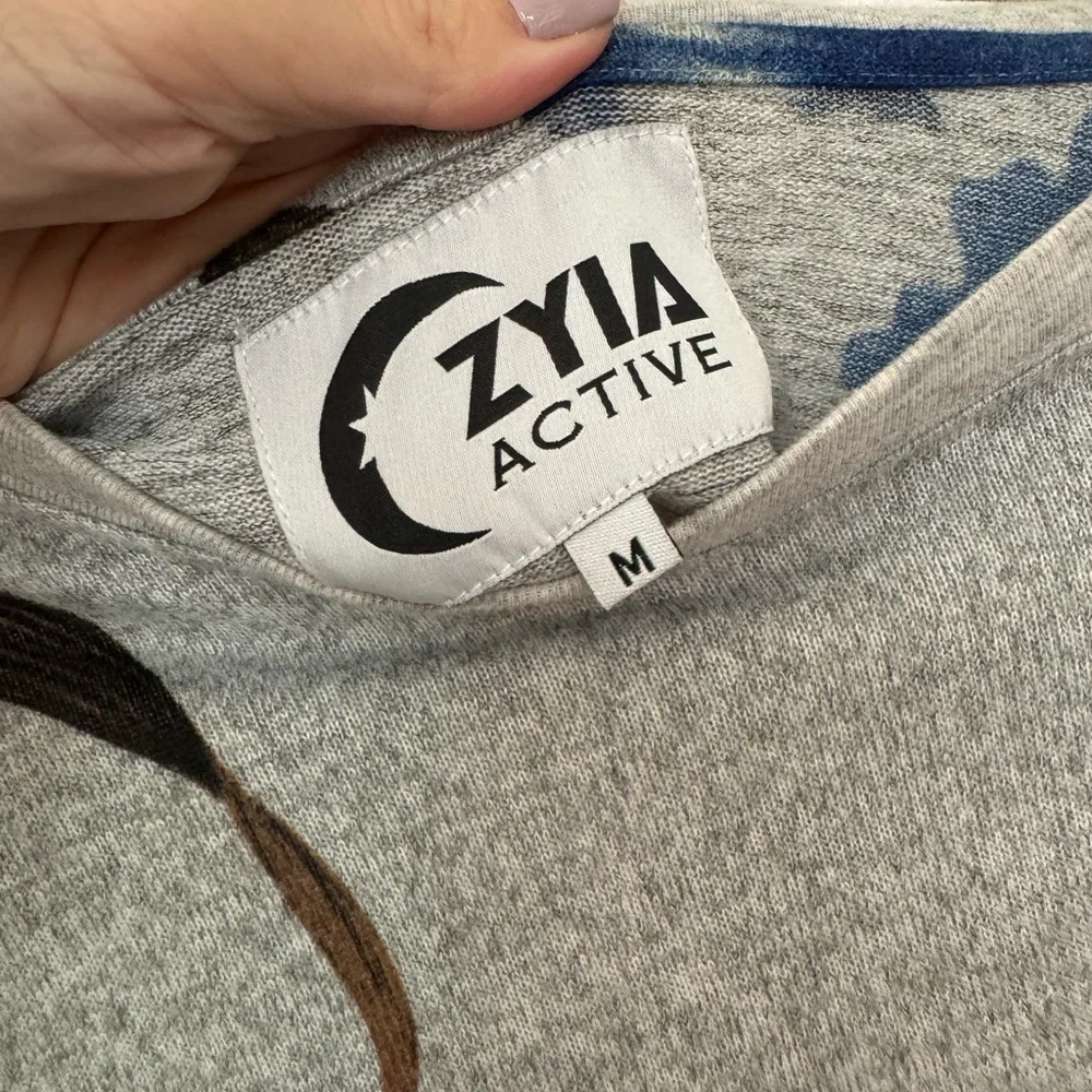 Zyia gray floral cropped sweatshirt. Good used condition.  Size medium - Picture 4 of 7